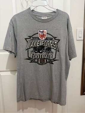 TC Grey Wake Forest Football Graphic Tee with Orange FedEx Logo